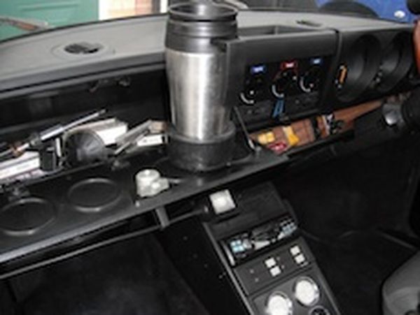 Car glove box with integrated cup-holders