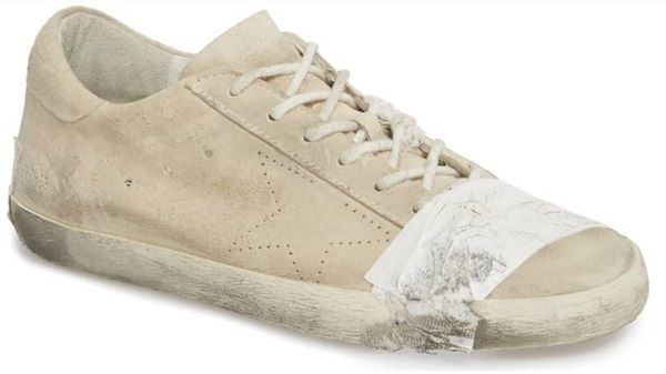 Pre-scuffed luxury footwear