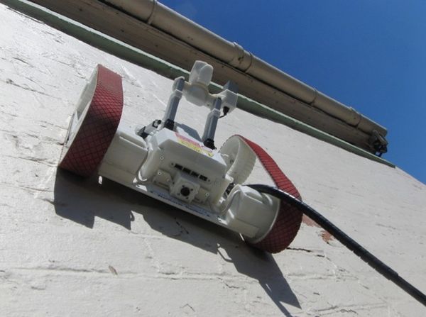 Suction wall climber