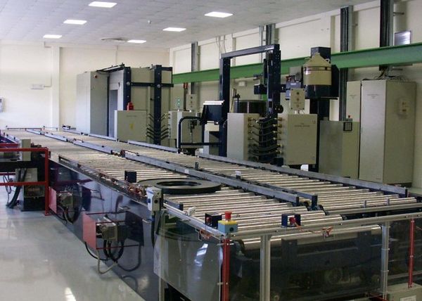 Conveyor based drum handling systems