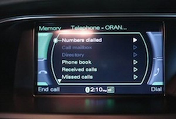 Voice activated telephone dialling
