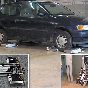 AVERT - An Autonomous Multi-Robot System for Vehicle Extraction and Transportation