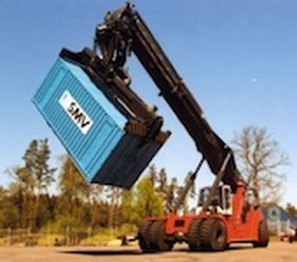 Empty grain from containers by inverting them