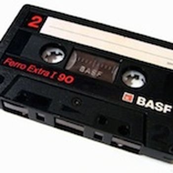 Cleaning strip at beginning of a cassette tape cleans tape heads