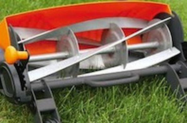 Self-sharpening lawn mower blades