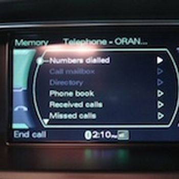 Voice activated telephone dialling