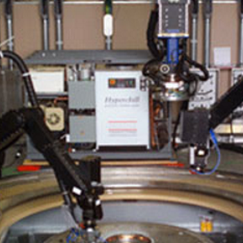 Yucca Mountain Waste Package Closure System