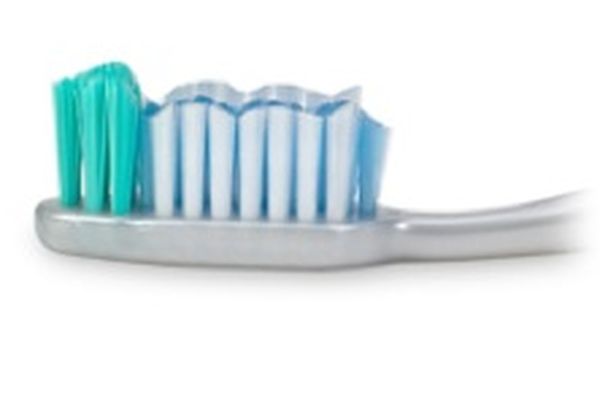 Use different types of fibres in a toothbrush