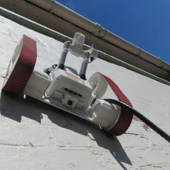 Suction wall climber