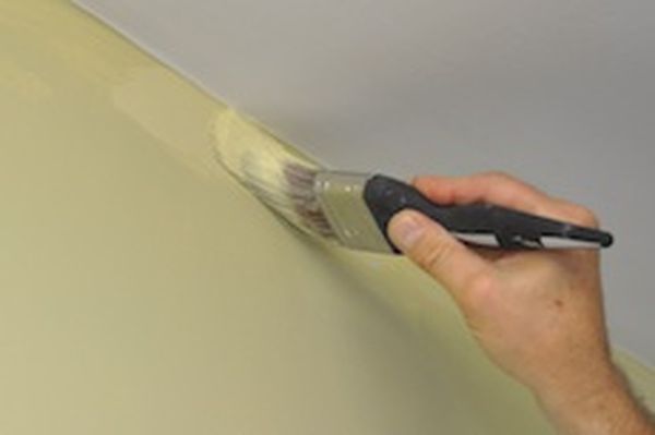 When painting walls, don't use the roller right up to the ceiling; touch up with a brush